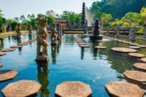 Tirta Gangga Water Palace, an exquisite representation of Balinese architecture, is situated at the foot of the majestic Mount Agung in East Bali, Indonesia. This stunning site, originally built in the mid-20th century by the king of Karangasem, has become a cultural landmark that embodies the harmonious relationship between nature and spirituality.